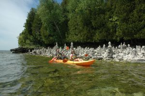 kayaking in door county at cave point rock stacks